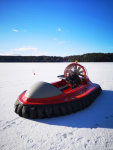 Typhoon hovercraft on frozen lake parked