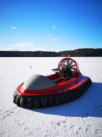 Typhoon hovercraft on frozen lake parked